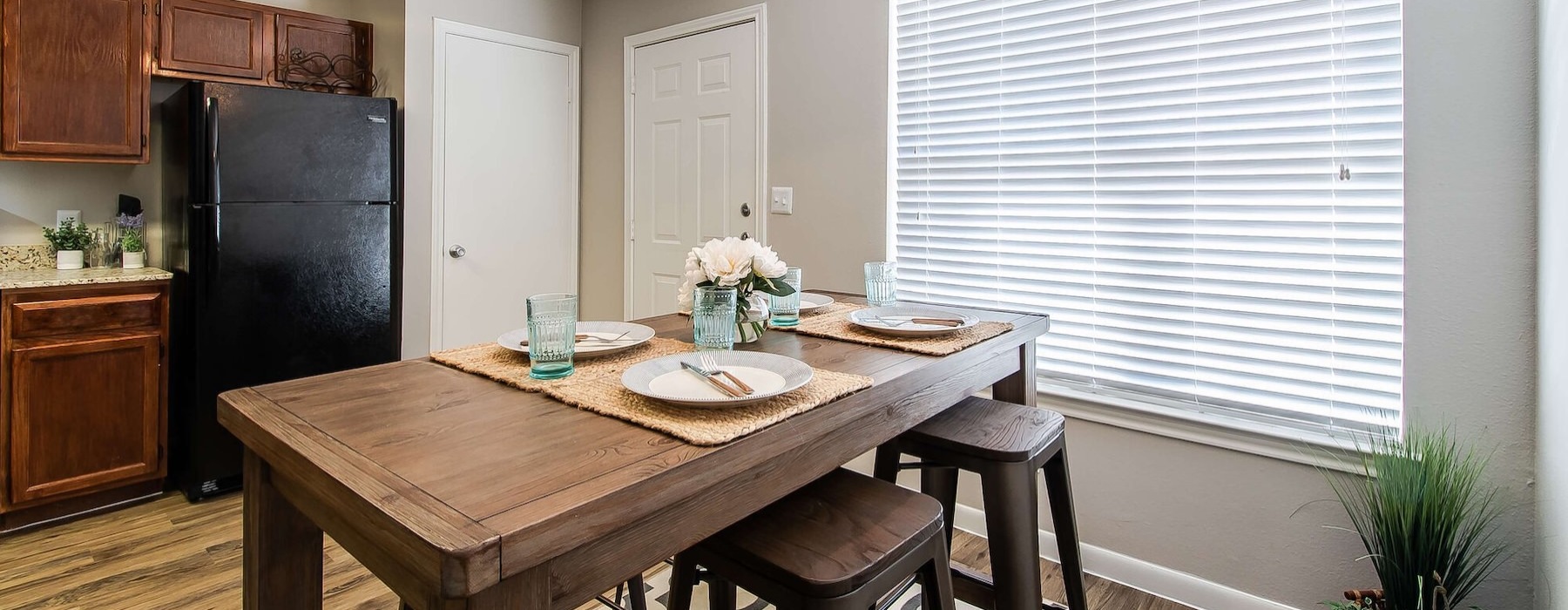 a dining table in a kitchen