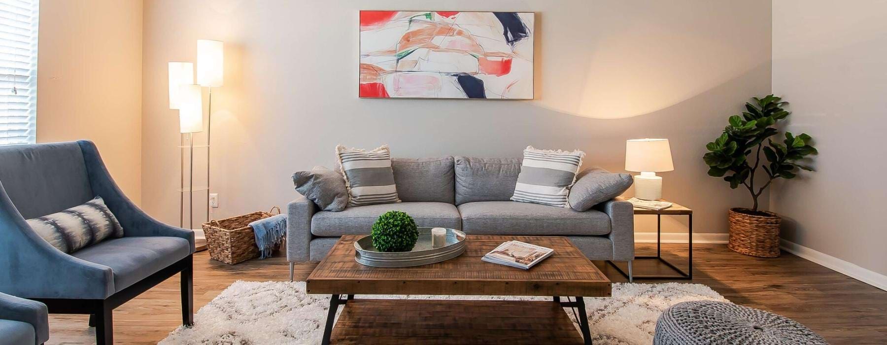 a living room with a couch and coffee table